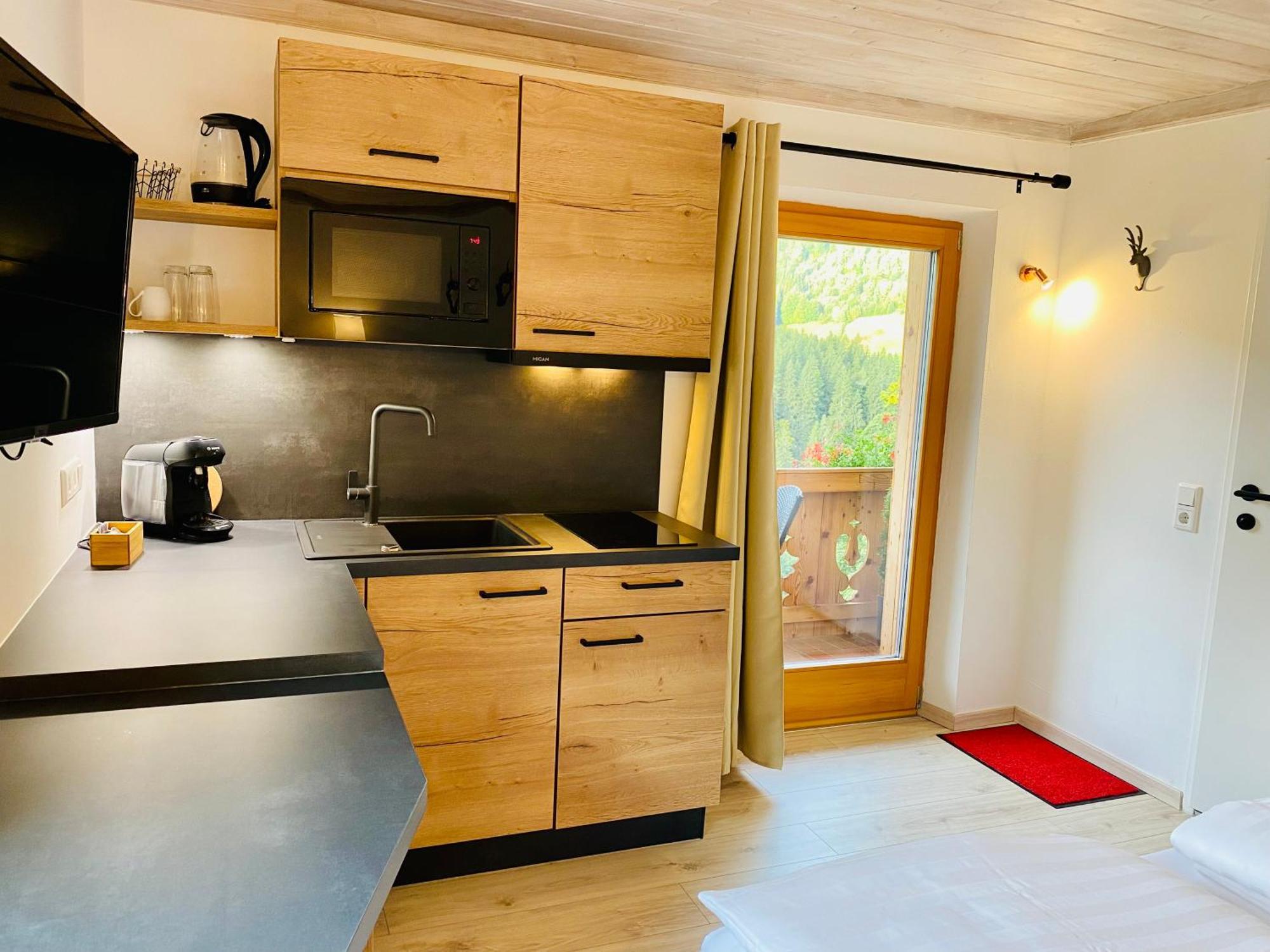 Alm Seasons Premium Chalet & Studios Saalbach-Hinterglemm Rum bild